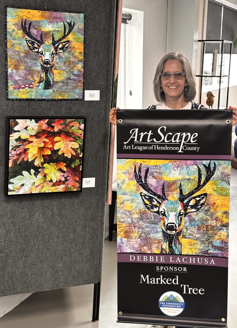 Debbie LaChusa with her Artscape Banner